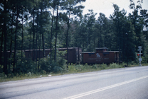 Photo of a train passing a grade crossing