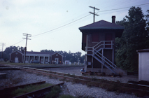HN cabin with the depot in the background