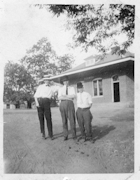 Photo of three men posing at Keswick depot