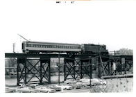 GP9 and heavyweight coach near Main Street Station