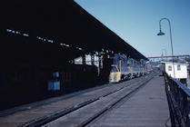 GP9's passing Main Street Station
